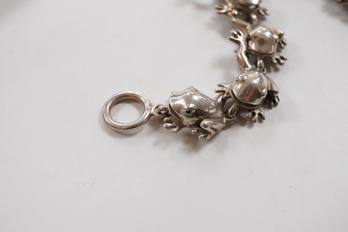 A recent white metal frog necklace, overall length 42cm and matching bracelet, 19cm, both stamped 925, gross 153 grams.